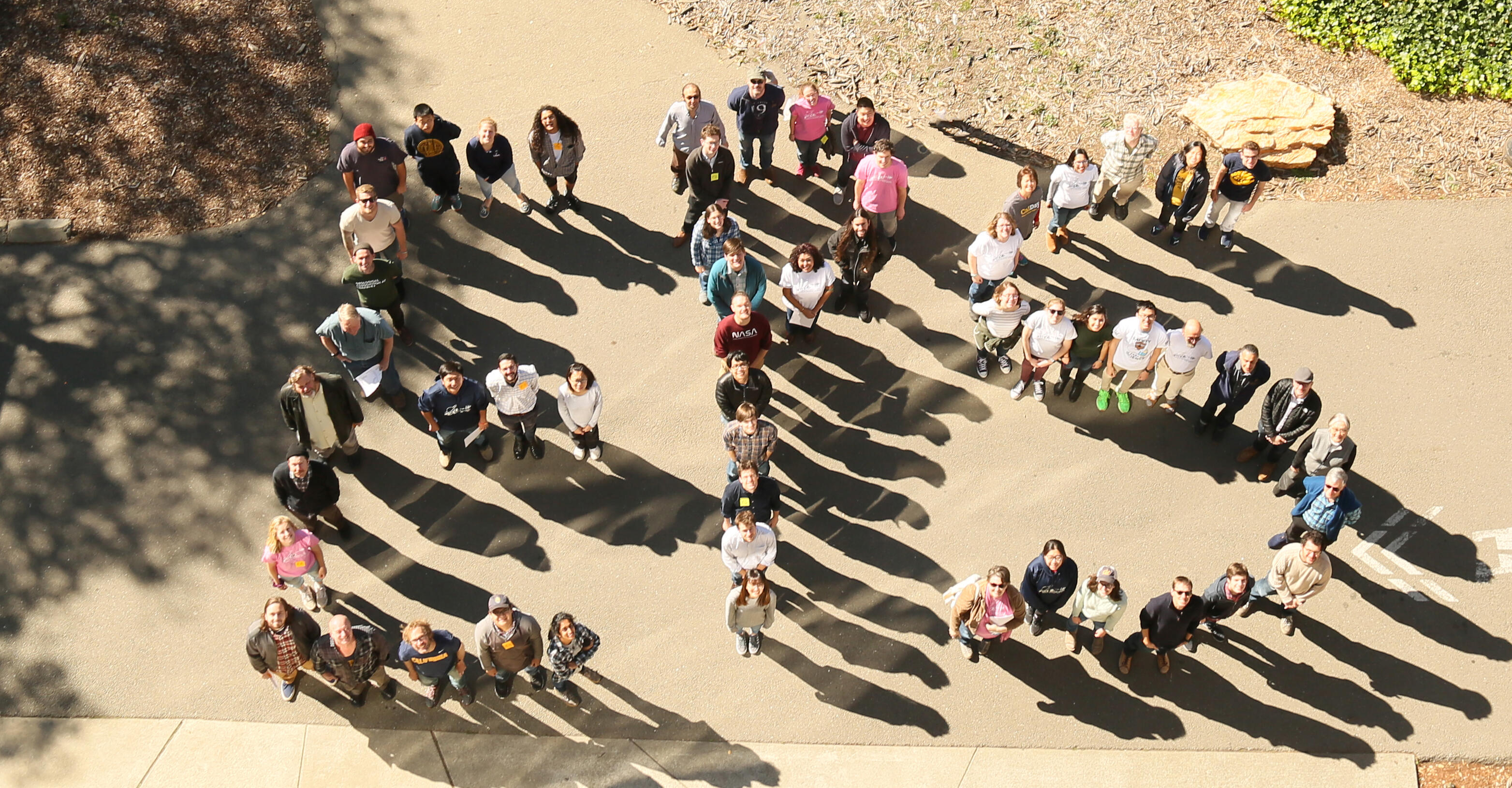 Group photo with department members standing in the shape of the letters "EPS"